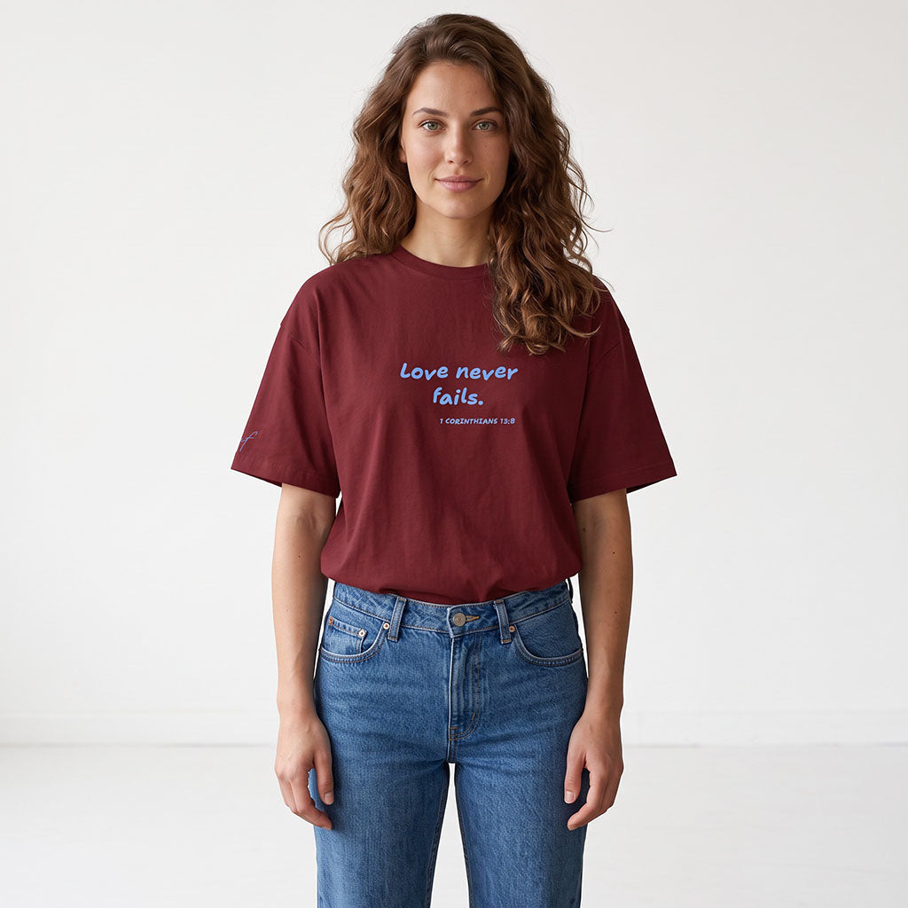 LOVE NEVER FAILS TEE