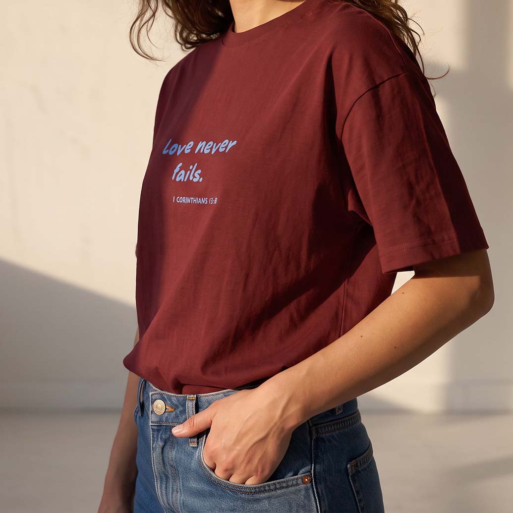 LOVE NEVER FAILS TEE