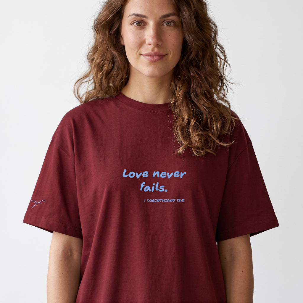 LOVE NEVER FAILS TEE